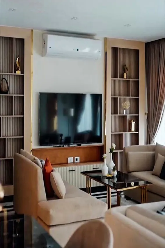 Bright and airy corner nook with a built-in daybed and colorful cushions.