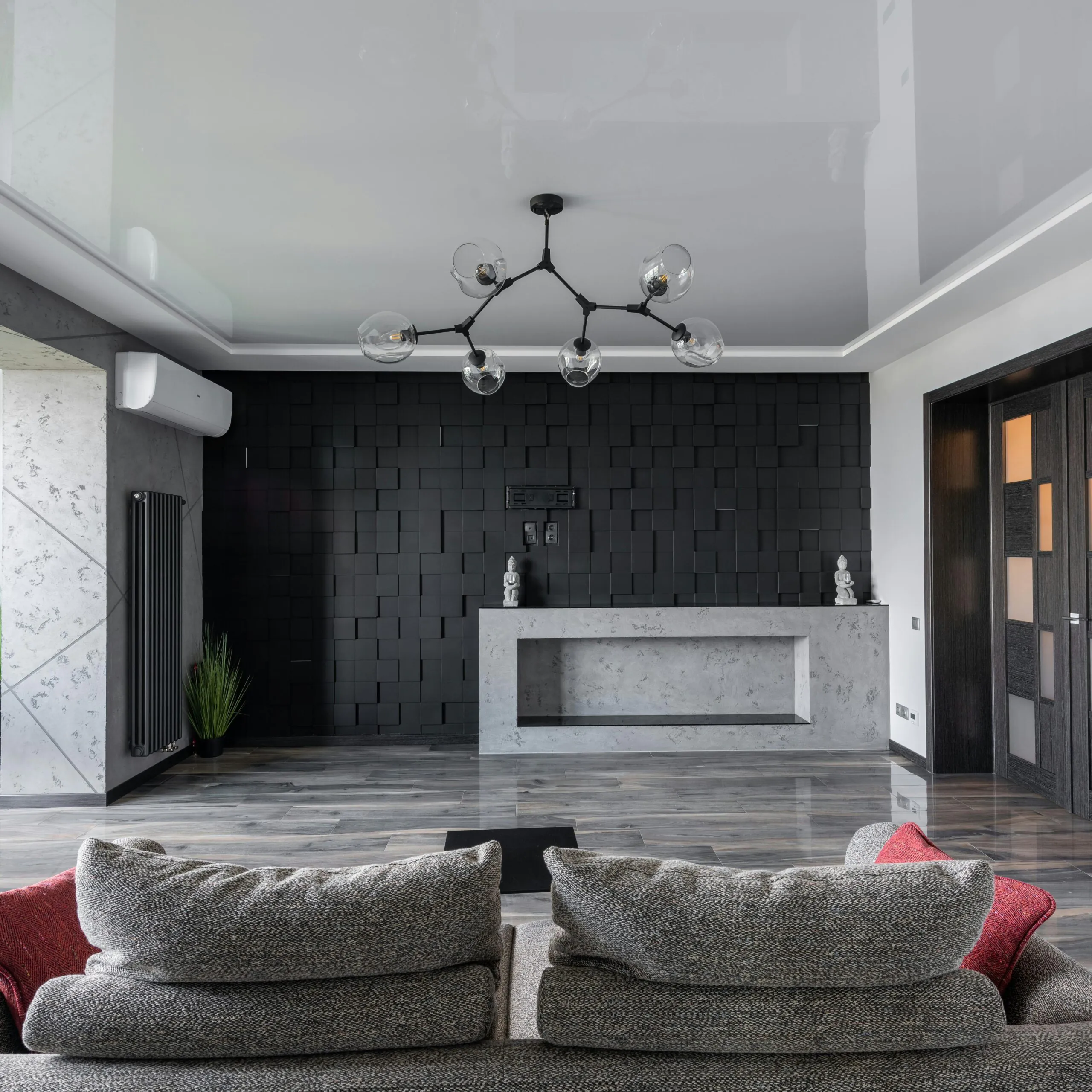 Stylish modern living room with a neutral color palette, abstract wall art, and premium finishes in New Cairo